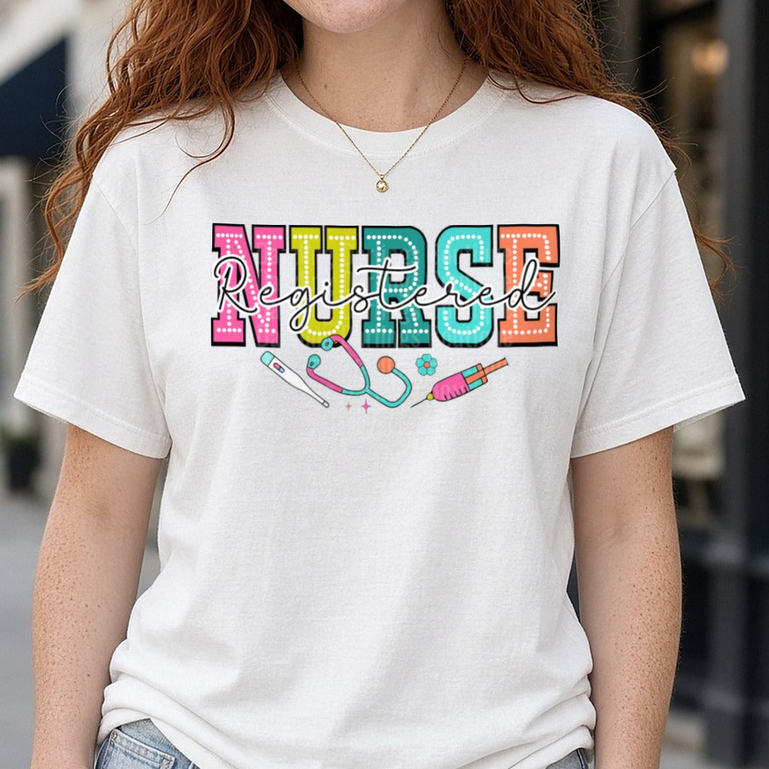 Registered Nurse Neon Marquee Letters Script DTF transfer shown on a Comfort Colors tee