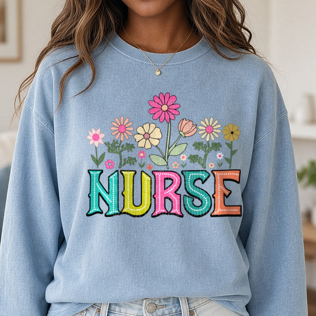 Nurse Wildflower DTF transfer shown on a Comfort Colors sweatshirt