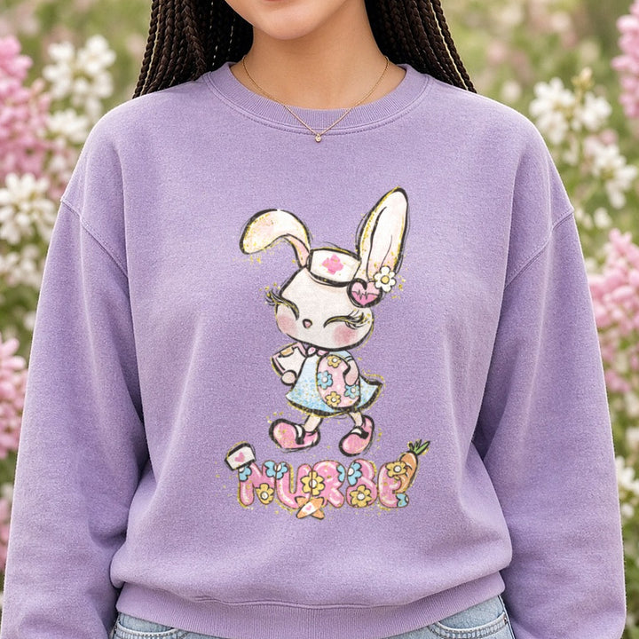 Cute Nurse Bunny DTF transfer shown on a Comfort Colors sweatshirt