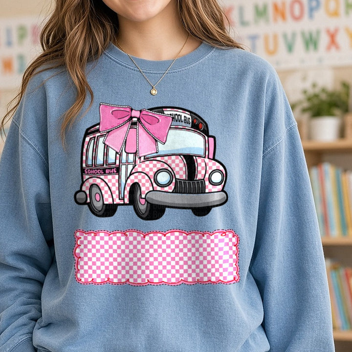 School Bus Girl Pink Checkered DTF transfer shown on a Comfort Colors sweatshirt