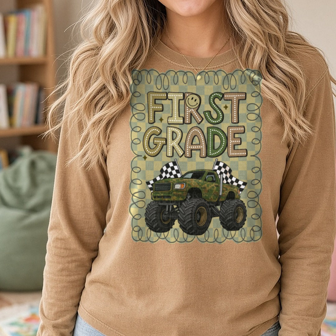 First Grade Camo Fourwheeler DTF transfer shown on a Comfort Colors long sleeve tee