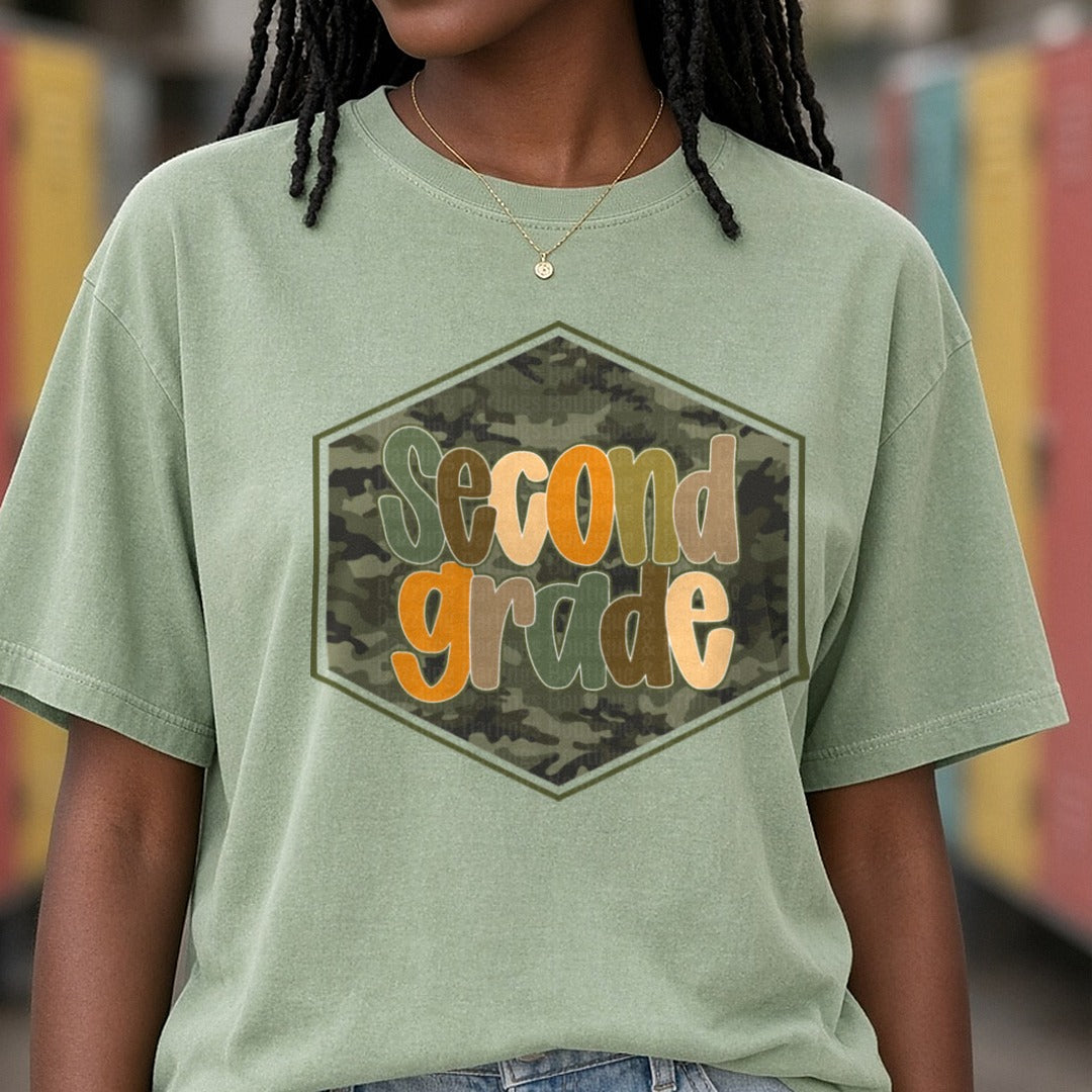 Second Grade Camo Hexagon Badge Orange Green Letters DTF transfer shown on a Comfort Colors tee