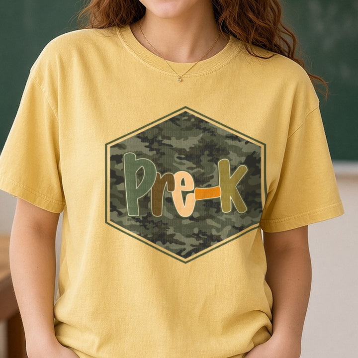 Pre-K Camo Hexagon Badge Orange Green Letters DTF transfer shown on a Comfort Colors tee