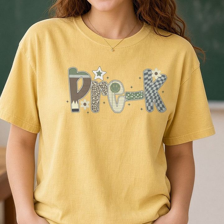 Pre-K Camo Patterned Letters Stars Leopard DTF transfer shown on a Comfort Colors tee