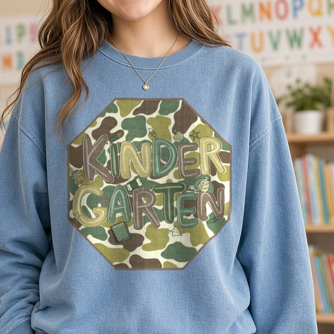 Kindergarten Camo Octagon Duck Camo Background DTF transfer shown on a Comfort Colors sweatshirt