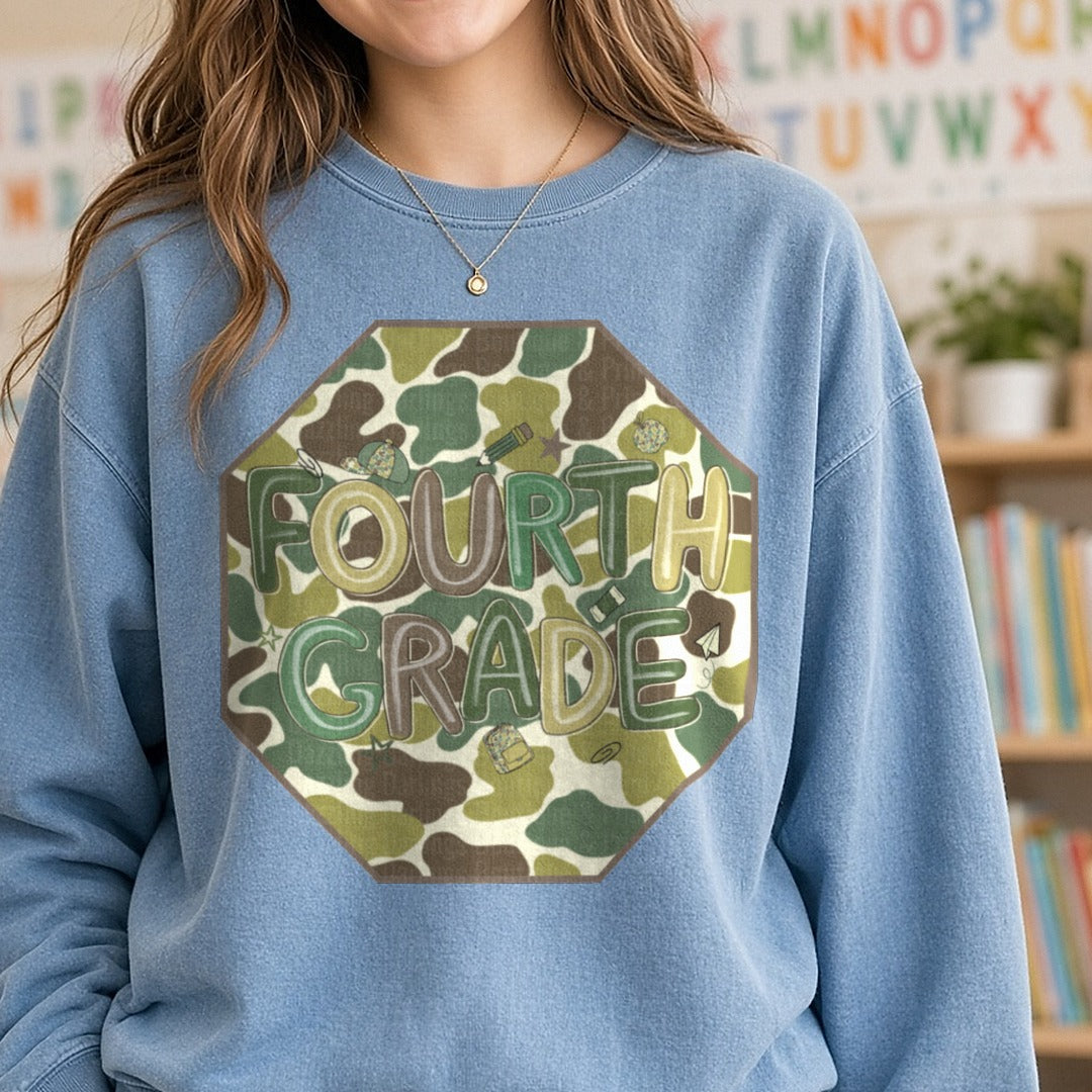 Fourth Grade Camo Octagon Duck Camo Background DTF transfer shown on a Comfort Colors sweatshirt
