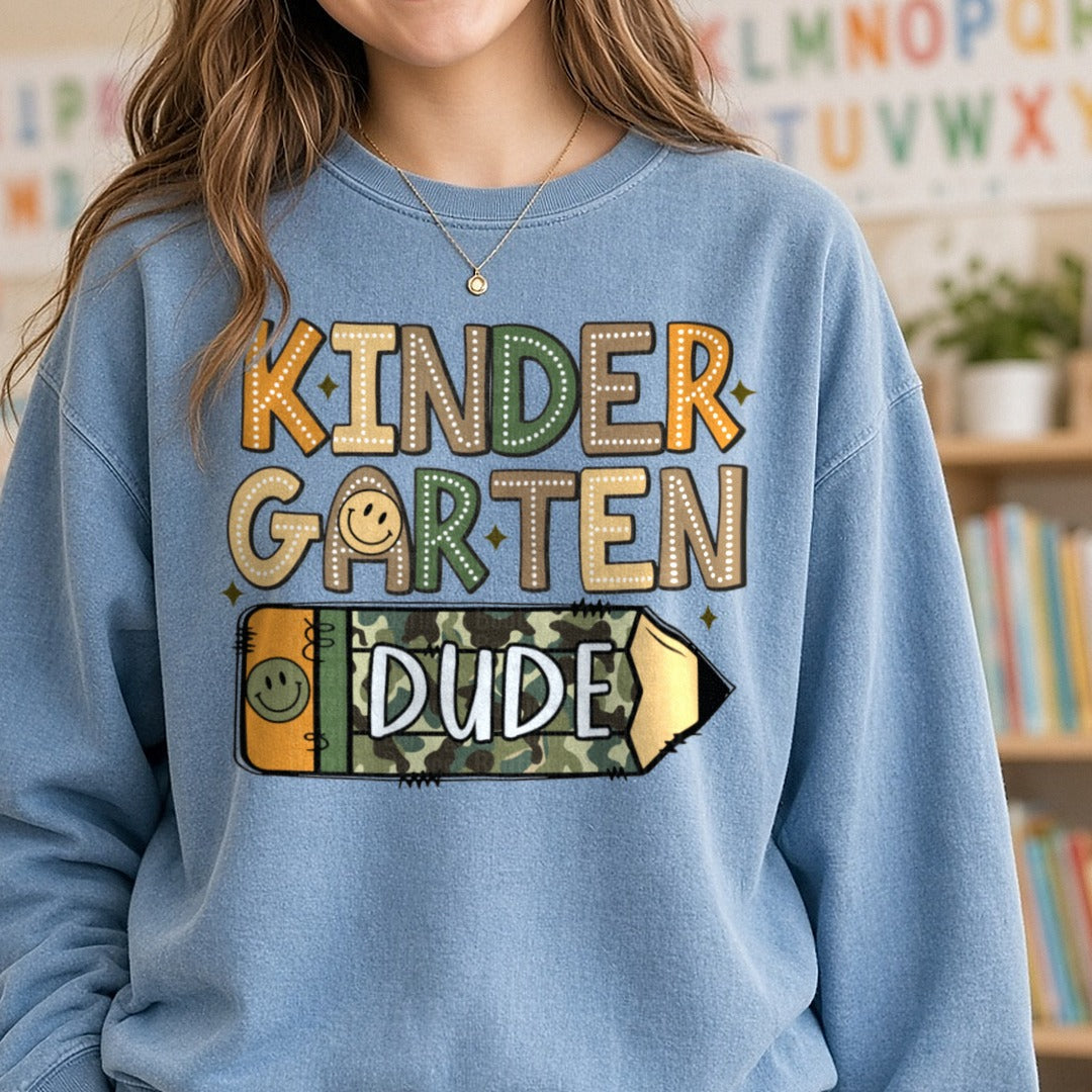 Kindergarten Dude Camo Pencil DTF transfer shown on a Comfort Colors sweatshirt