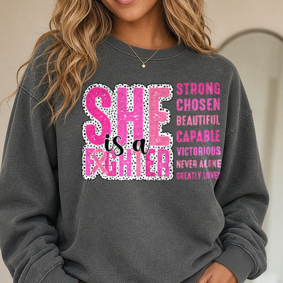 Breast Cancer Awareness She Is a Fighter DTF transfer shown on a Comfort Colors sweatshirt
