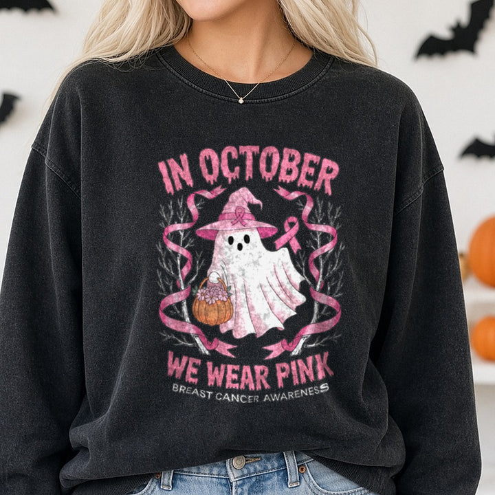 Breast Cancer Awareness in October We Wear Pink Ghost DTF transfer shown on a Comfort Colors sweatshirt