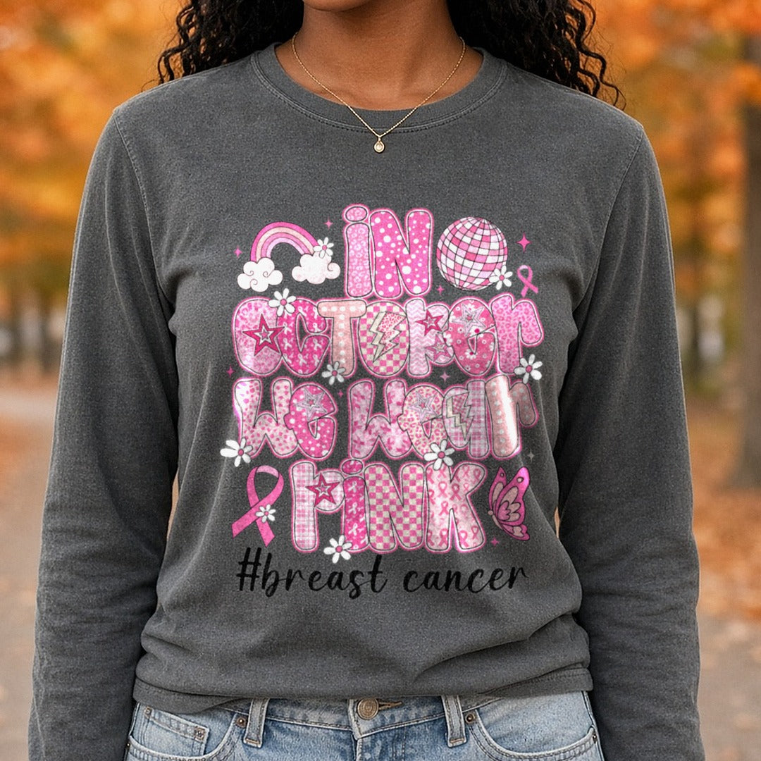 Breast Cancer Awareness Ribbon in October We Wear Pink Doodle Letters DTF transfer shown on a Comfort Colors long sleeve tee