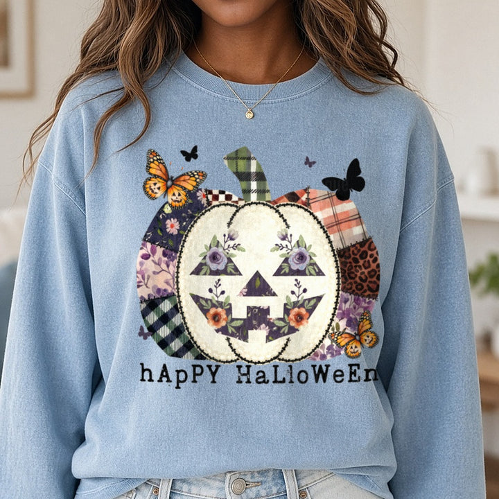 Patchwork Happy Halloween DTF transfer shown on a Comfort Colors sweatshirt