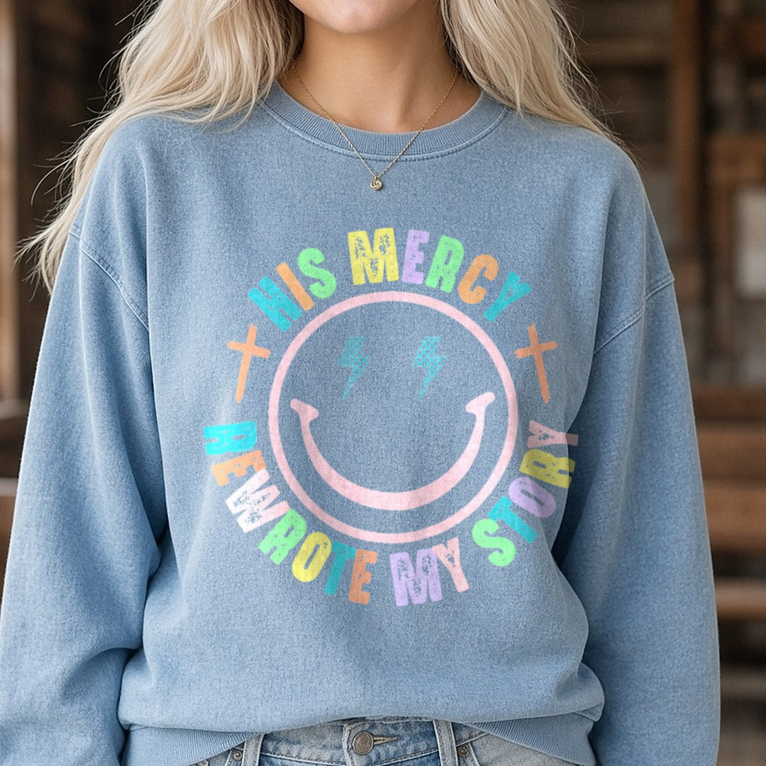 His Mercy Rewrote My Story Smiley DTF transfer shown on a Comfort Colors sweatshirt