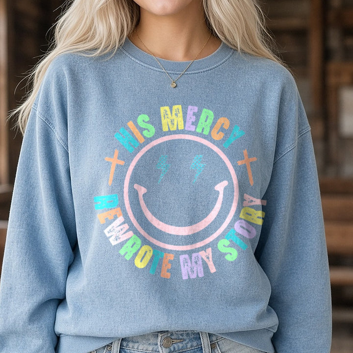 His Mercy Rewrote My Story Smiley DTF transfer shown on a Comfort Colors sweatshirt