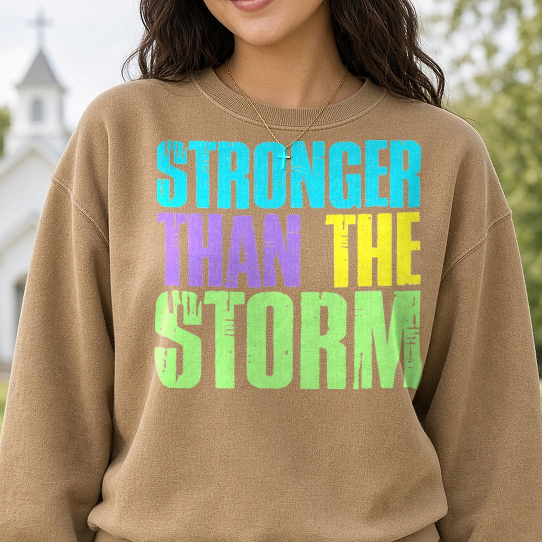 Stronger Than the Storm DTF transfer shown on a Comfort Colors sweatshirt