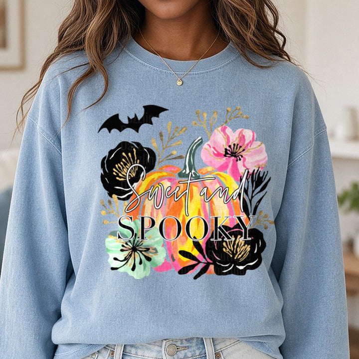 Sweet And Spooky DTF transfer shown on a Comfort Colors sweatshirt