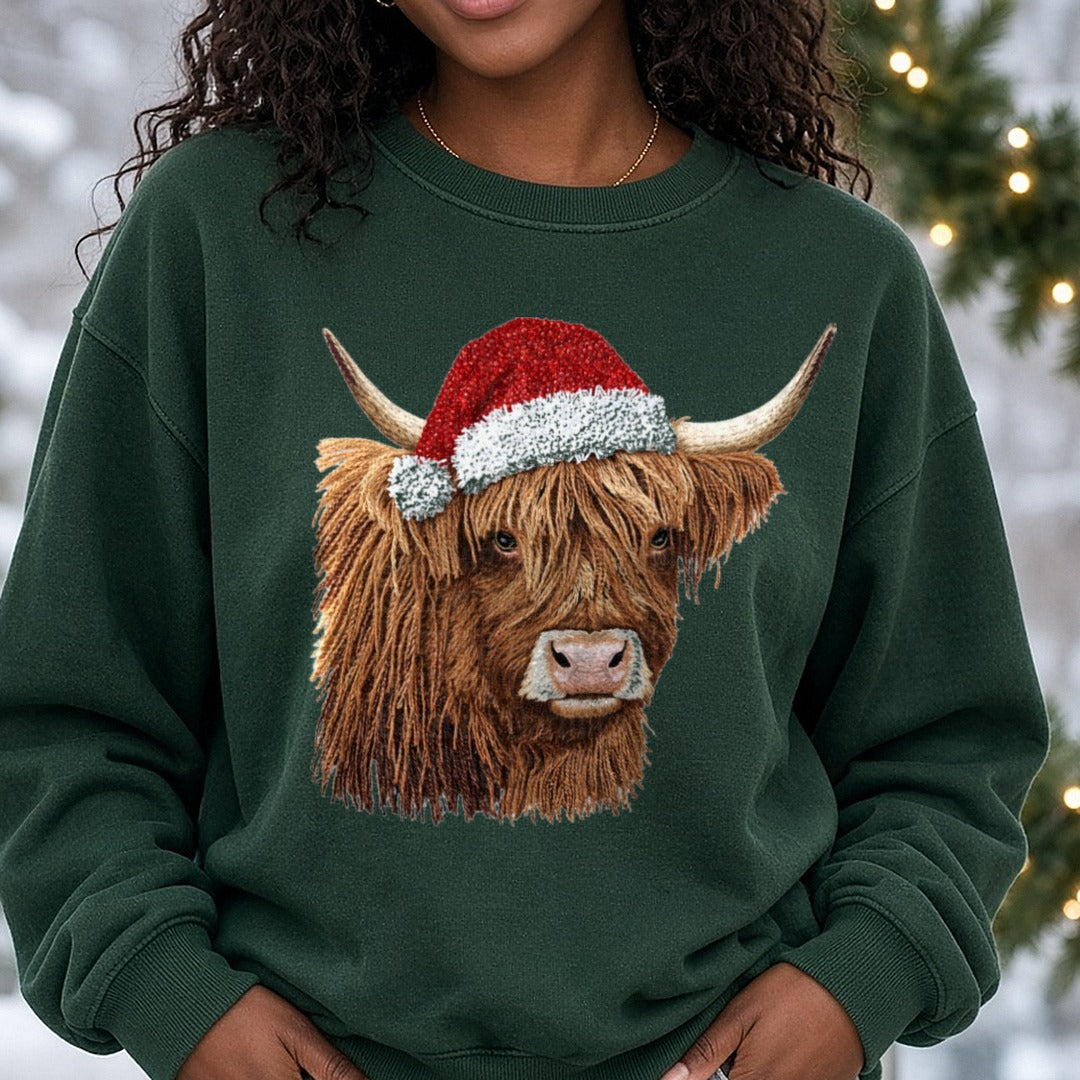 Christmas Highland Cow Faux Yarn DTF transfer shown on a Comfort Colors sweatshirt