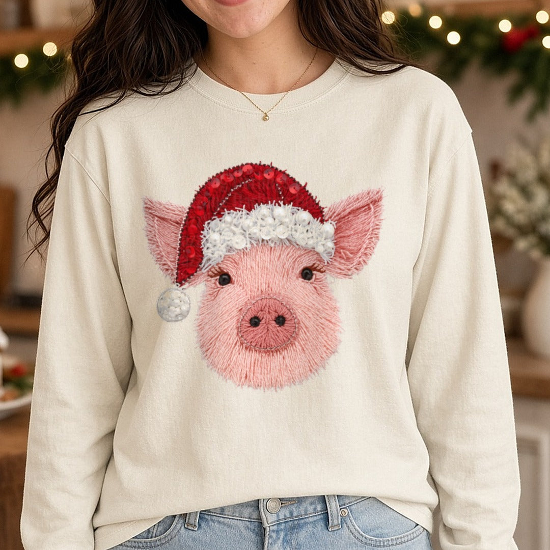 Christmas Pig Faux Yarn DTF transfer shown on a Comfort Colors long sleeve tee