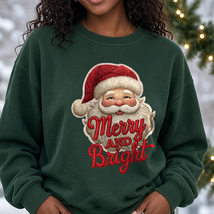 Merry and Bright Faux Yarn Santa DTF transfer shown on a Comfort Colors sweatshirt