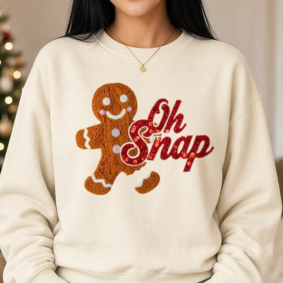Oh Snap Gingerbread Faux Yarn Sequins DTF transfer shown on a Comfort Colors sweatshirt