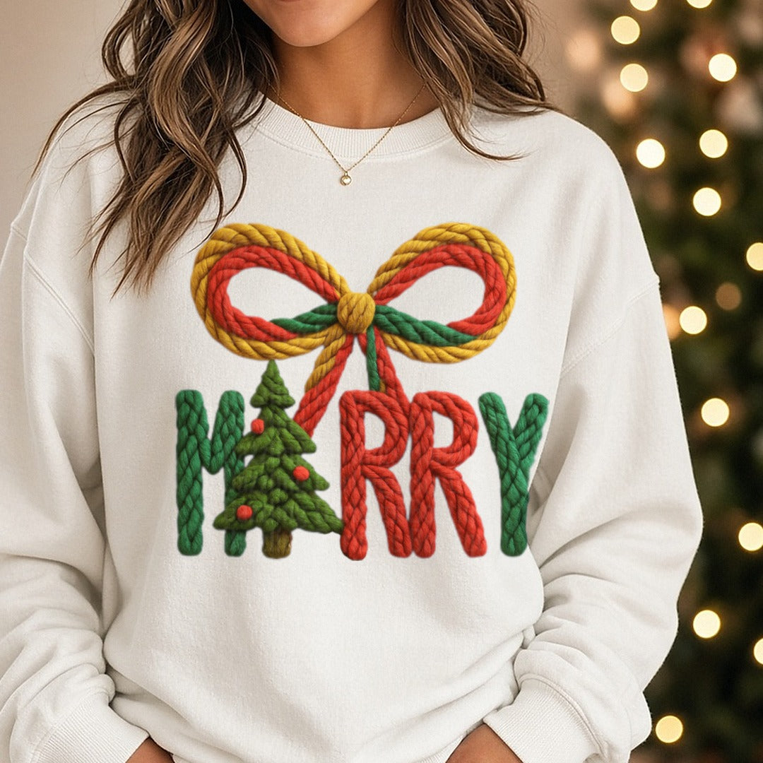 Crochet Merry with Coquette Bow and Tree DTF transfer shown on a Comfort Colors sweatshirt