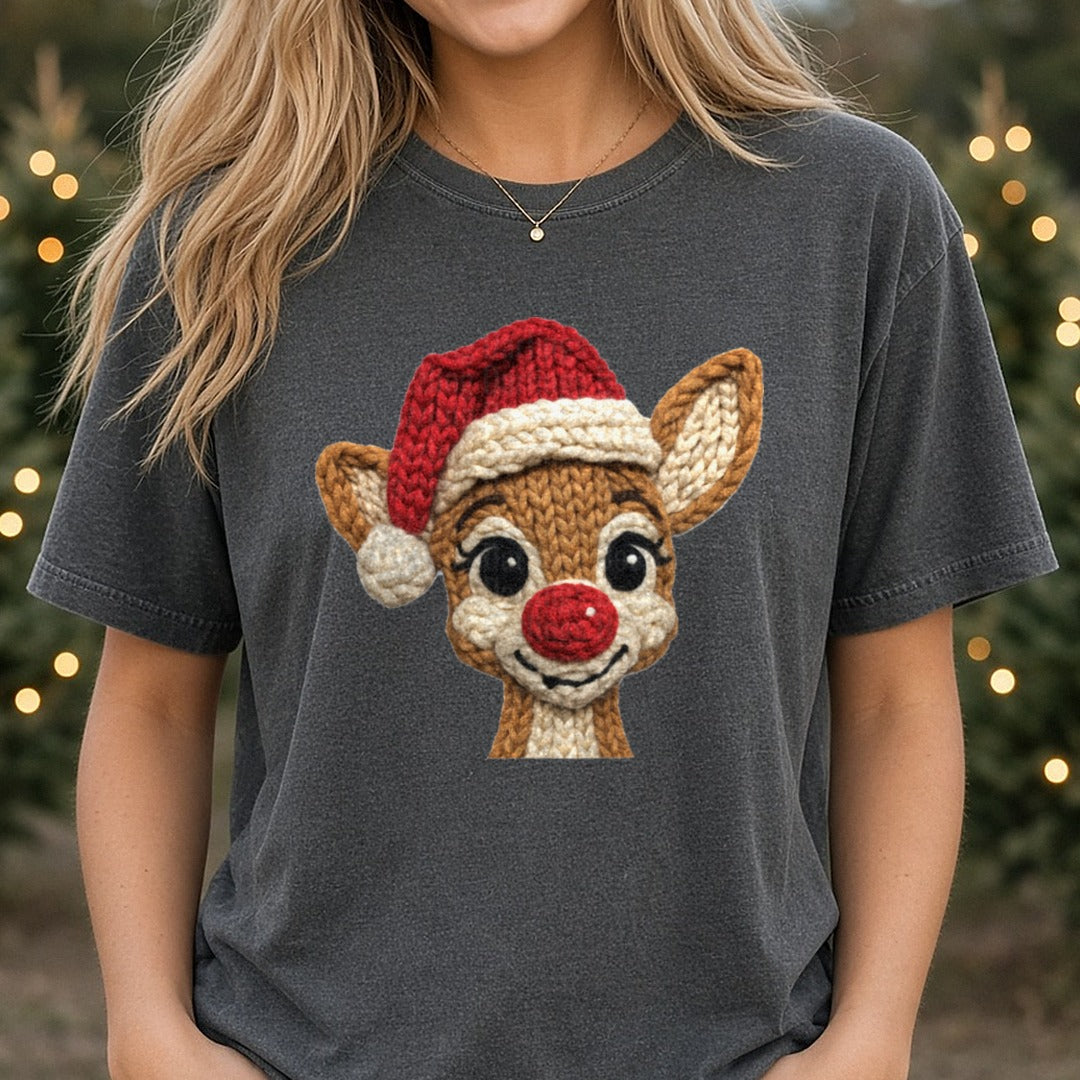 Crochet Baby Reindeer with Santa Hat DTF transfer shown on a Comfort Colors tee