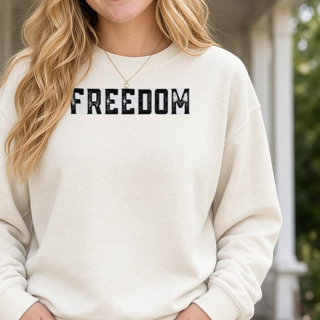 Freedom Black Distressed Block Letters DTF transfer shown on a Comfort Colors sweatshirt
