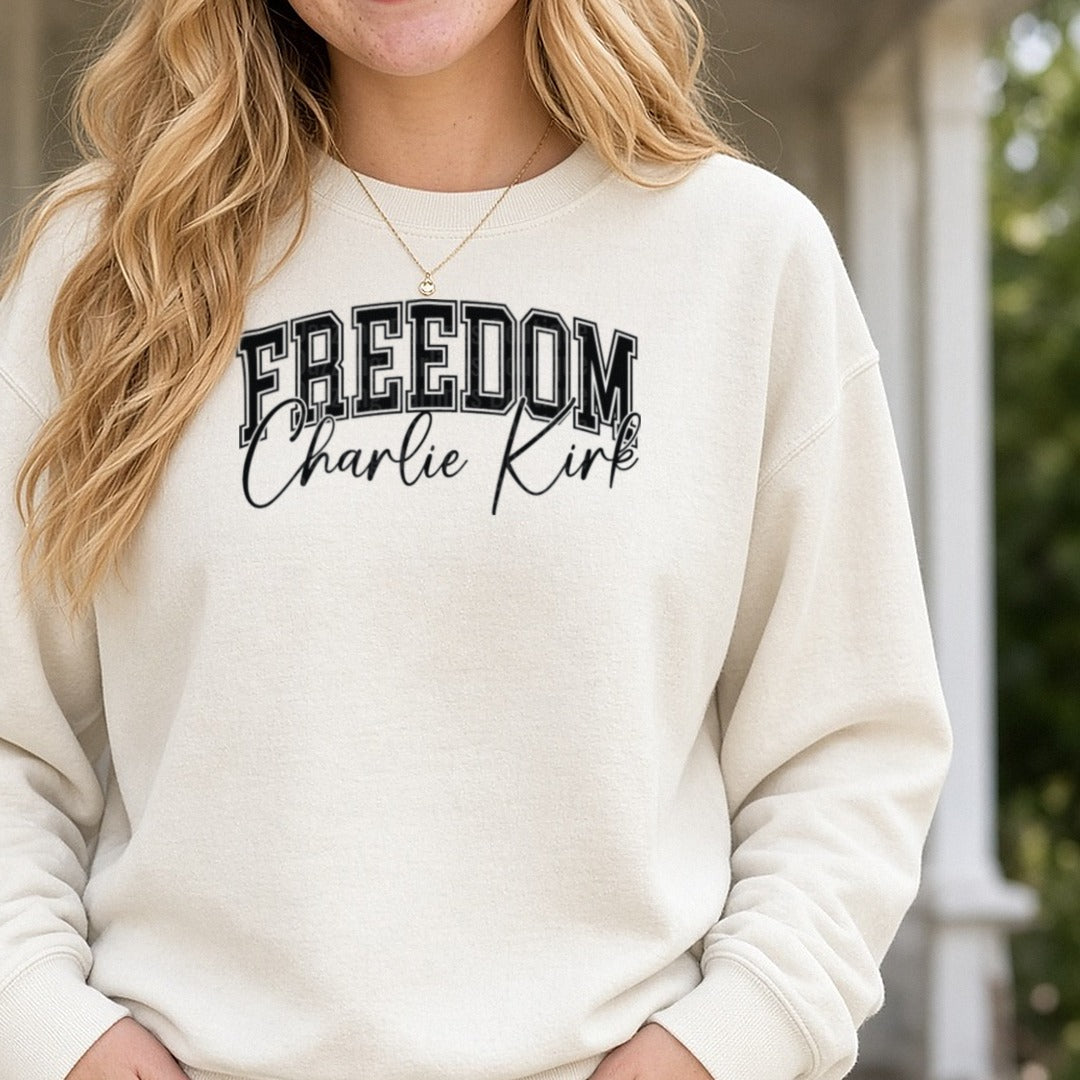 Freedom Charlie Kirk Black Varsity Script Overlay DTF transfer shown on a Comfort Colors sweatshirt