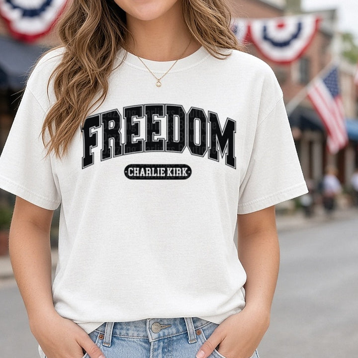 Freedom Charlie Kirk Black Arch Distressed Banner DTF transfer shown on a Comfort Colors tee