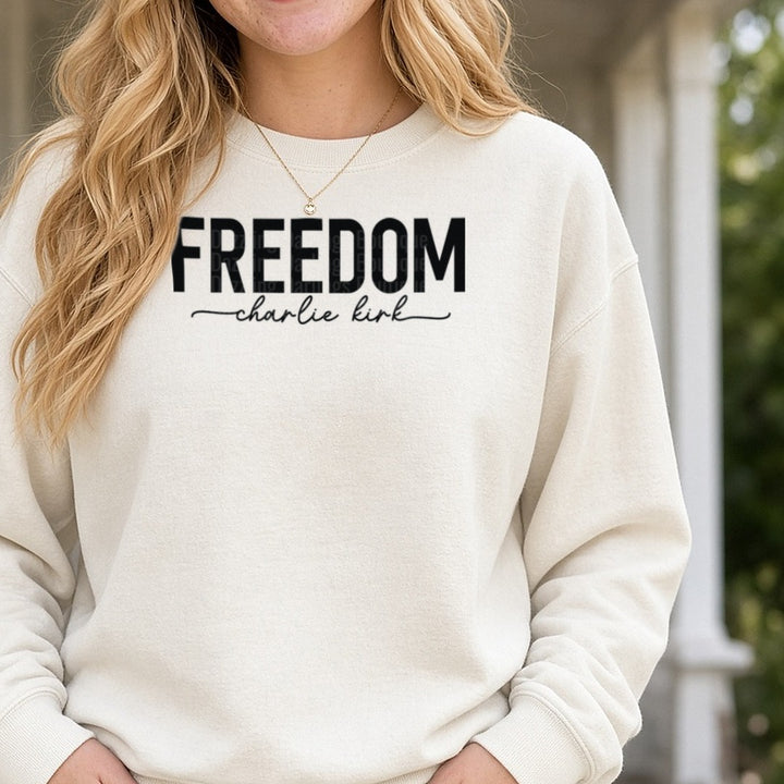 Freedom Charlie Kirk Black Bold Thin Script DTF transfer shown on a Comfort Colors sweatshirt