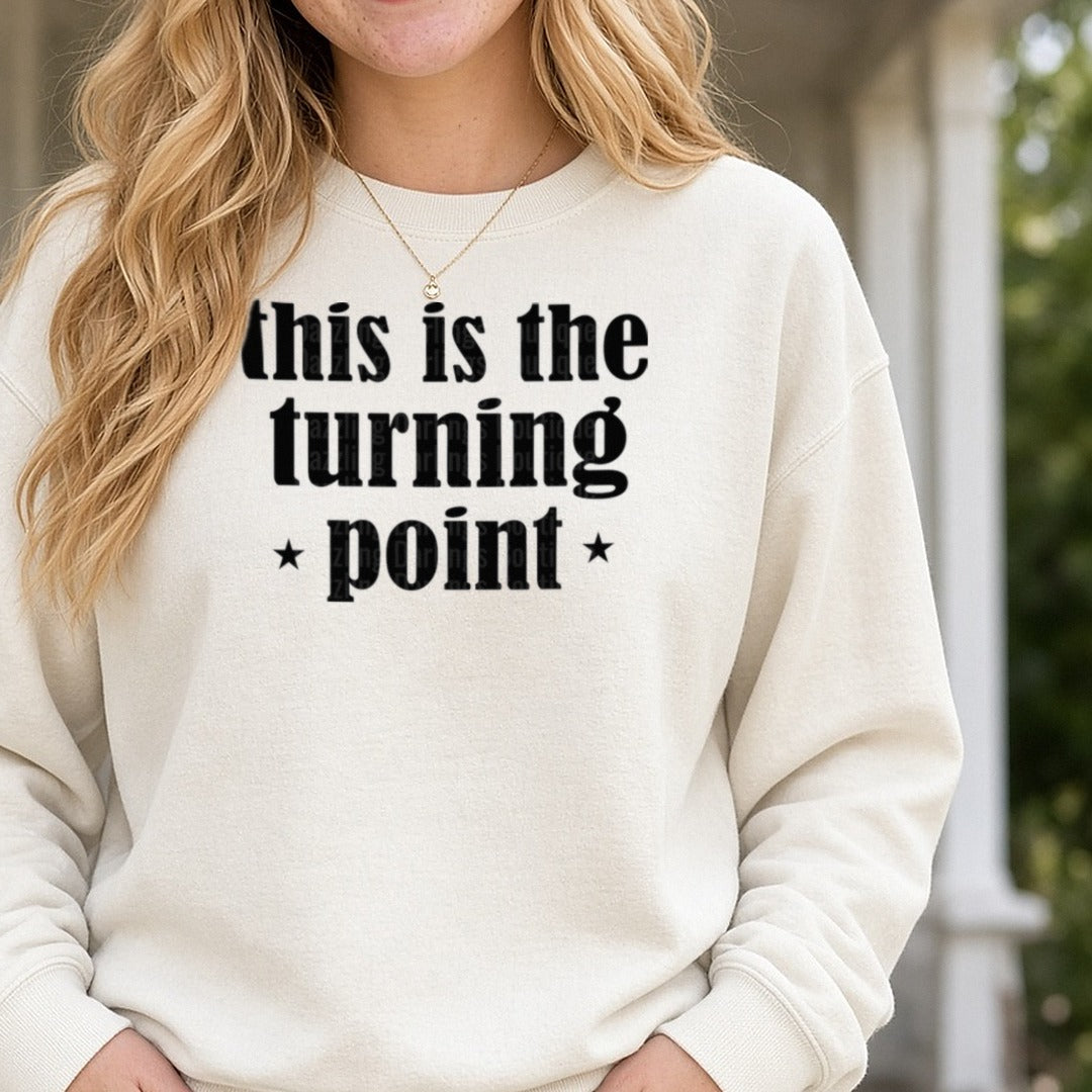 This Is The Turning Point Bold Black Stars DTF transfer shown on a Comfort Colors sweatshirt