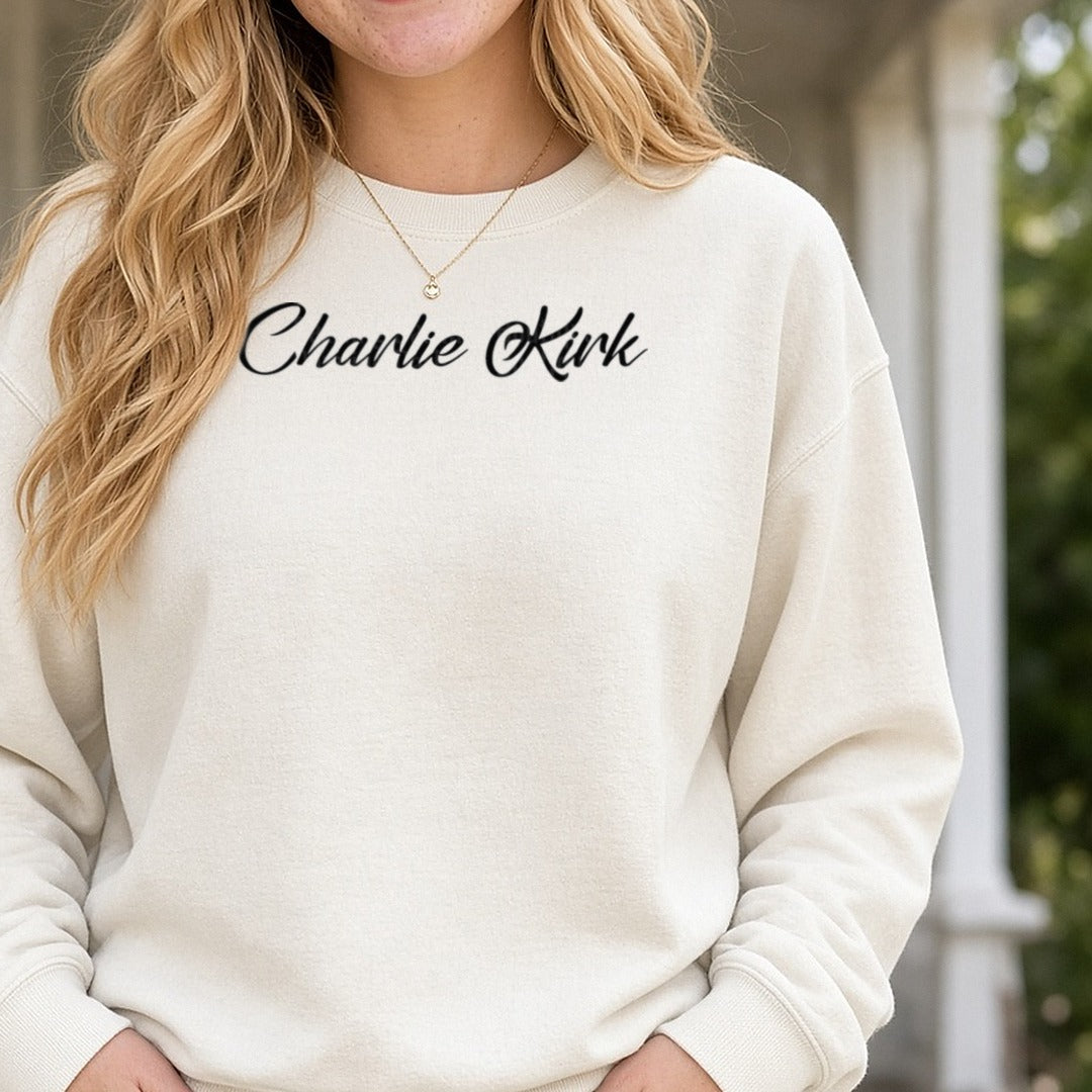 Charlie Kirk Black Script Signature DTF transfer shown on a Comfort Colors sweatshirt