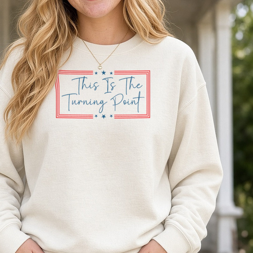 This Is The Turning Point Blue Script Red Frame DTF transfer shown on a Comfort Colors sweatshirt