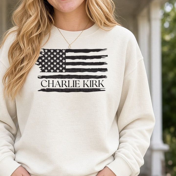Charlie Kirk Black Distressed Flag DTF transfer shown on a Comfort Colors sweatshirt