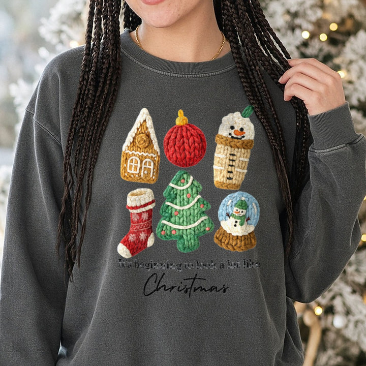 It's Beginning to Look Alot Like Christmas DTF transfer shown on a Comfort Colors sweatshirt