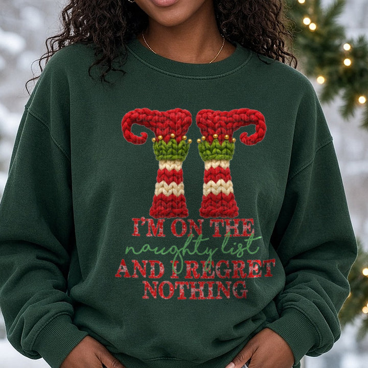 Im on the Naughty List DTF transfer shown on a Comfort Colors sweatshirt