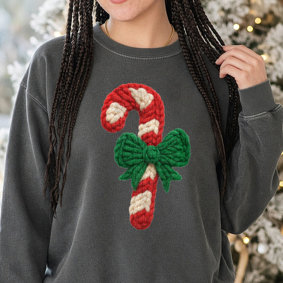 Candy Cane Bow Faux Yarn DTF transfer shown on a Comfort Colors sweatshirt