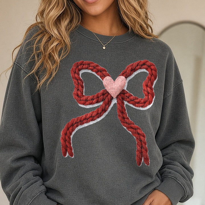 Valentines Bow Yarn DTF transfer shown on a Comfort Colors sweatshirt