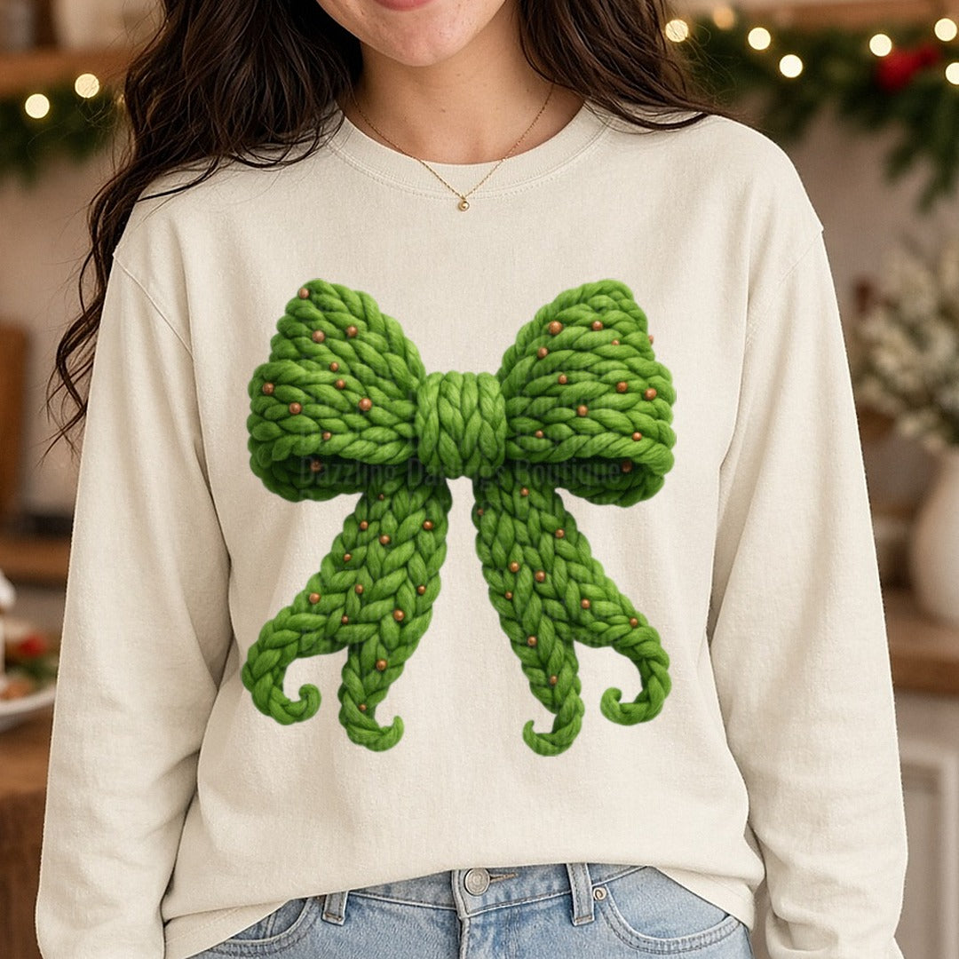 Green Christmas Faux Yarn Bow DTF transfer shown on a Comfort Colors long sleeve tee