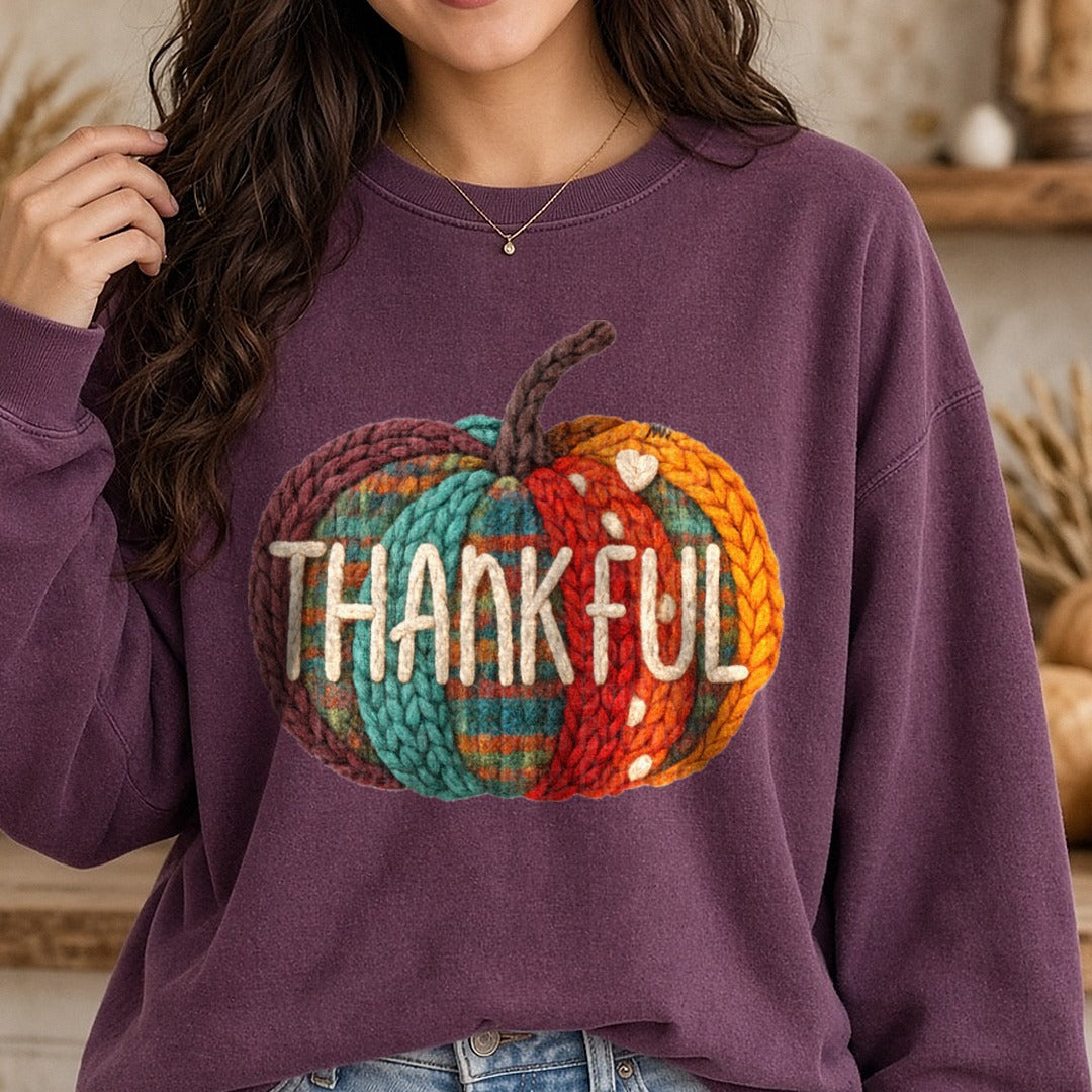 Thankful Plaid Pumpkin Yarn DTF transfer shown on a Comfort Colors sweatshirt
