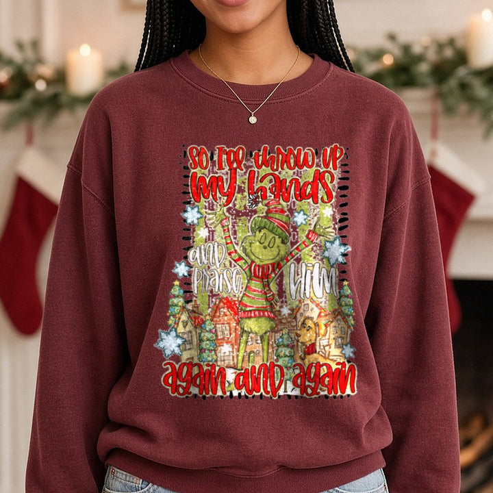 Praise him Christmas DTF transfer shown on a Comfort Colors sweatshirt