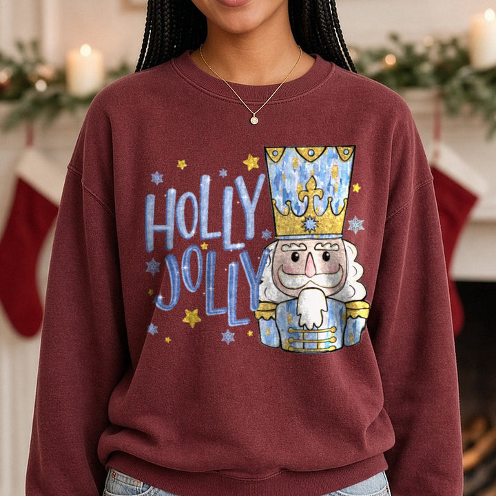 Holly Jolly Nutcracker Blue DTF transfer shown on a Comfort Colors sweatshirt