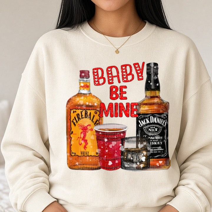 Baby Be Mine Whiskey Valentine DTF transfer shown on a Comfort Colors sweatshirt