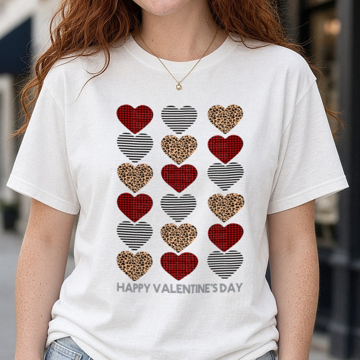 Happy Valentine's Day Leopard Plaid Striped Hearts DTF transfer shown on a Comfort Colors tee
