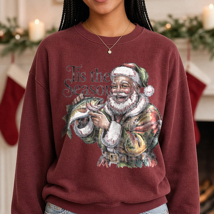 Darker skin tone Santa fishing - Copy DTF transfer shown on a Comfort Colors sweatshirt