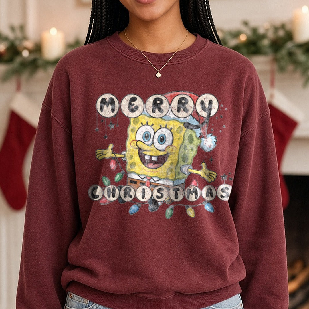 Merry Christmas SpongeBob DTF transfer shown on a Comfort Colors sweatshirt