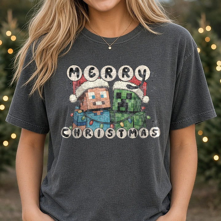 Merry Christmas Minecraft DTF transfer shown on a Comfort Colors tee