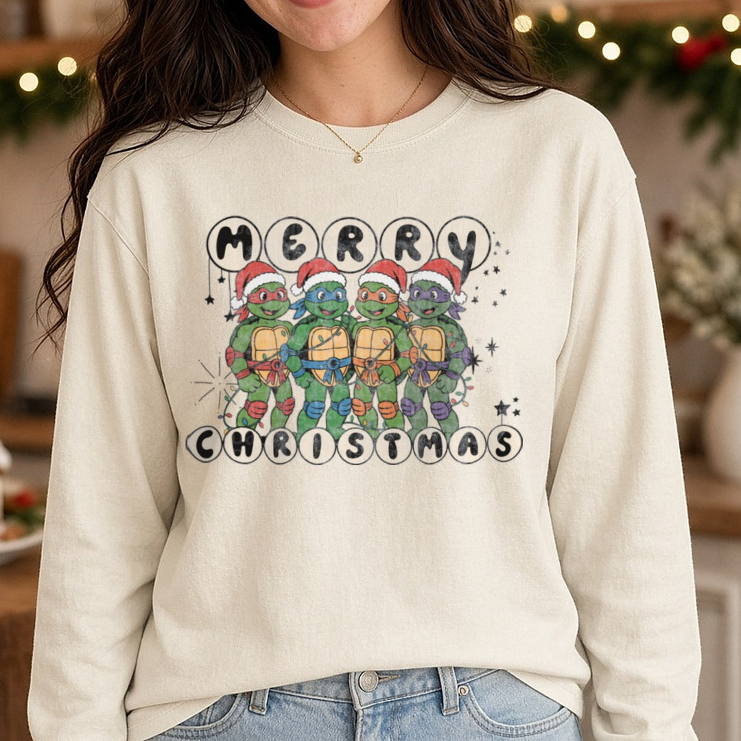 Merry Christmas Ninja turtles DTF transfer shown on a Comfort Colors long sleeve tee