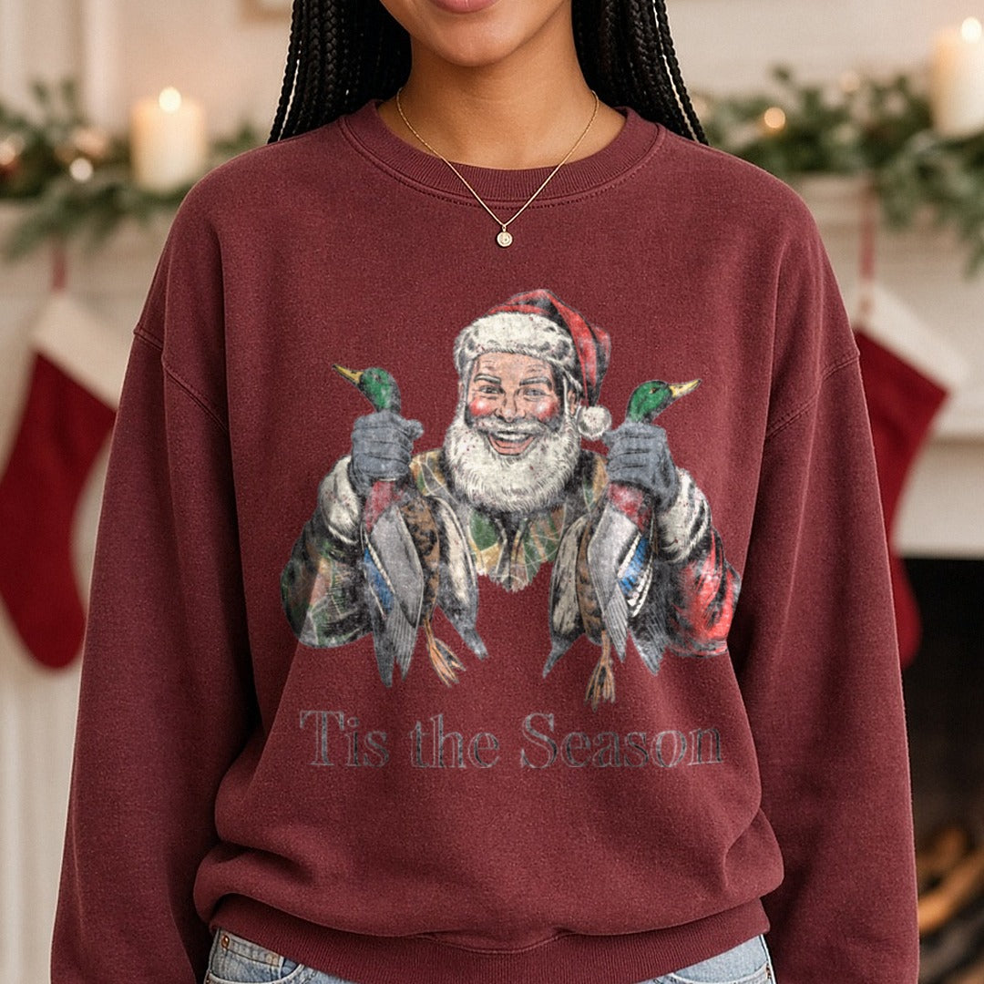 Santa duck hunting 2 DTF transfer shown on a Comfort Colors sweatshirt