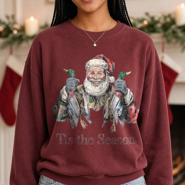 Santa duck hunting 2 DTF transfer shown on a Comfort Colors sweatshirt