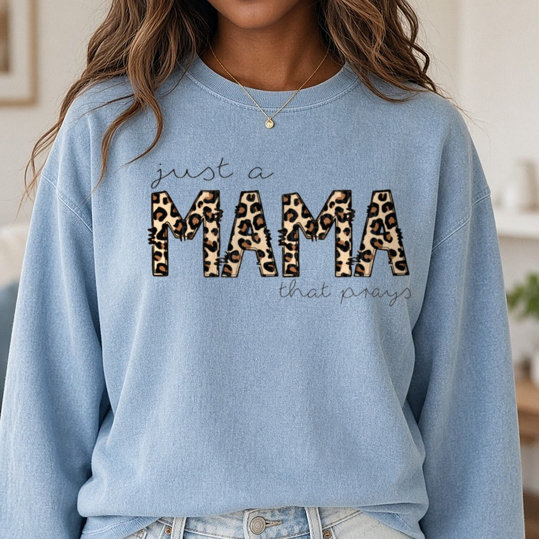 Just A Mama That Prays Leopard Letters DTF transfer shown on a Comfort Colors sweatshirt